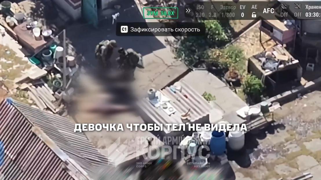 Aerial footage of Russian troops with an abducted girl in a war-torn village.