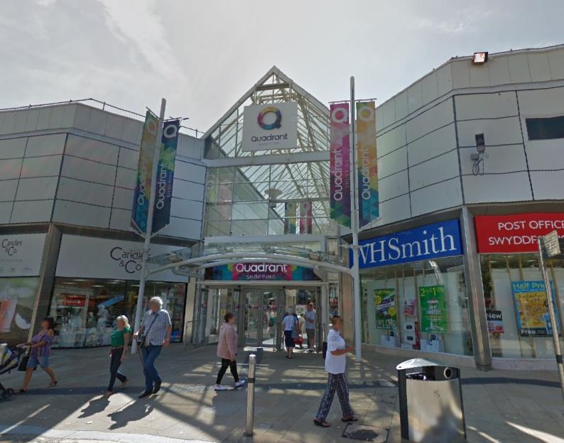 Woman died after falling on escalator at WHSmith in UK shopping centre