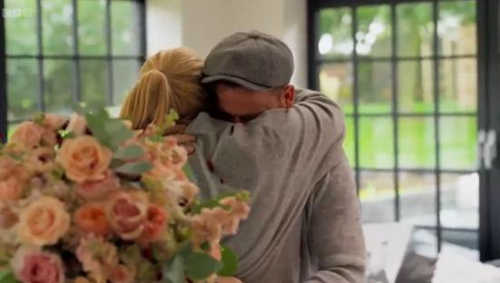 Joe Swash crying while embracing Stacey Solomon.
