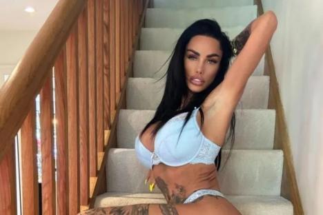 Katie Price shows off her shrinking frame as she poses on stairs in racy lingerie shoot – with giant plaster on her bum