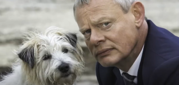 A man and his dog.