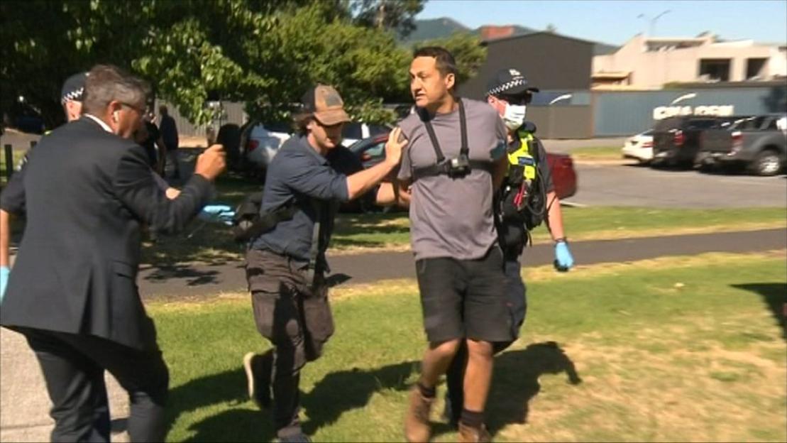 Arrest of Dezi Freeman at an anti-government protest.