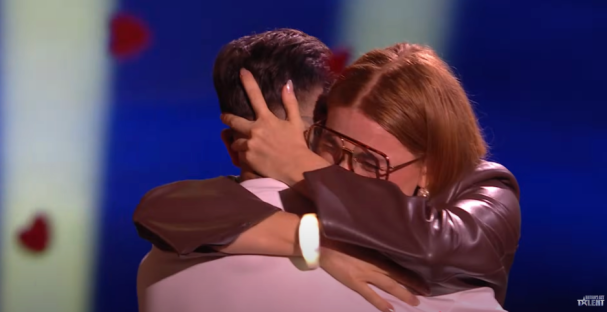 A woman embracing a man.