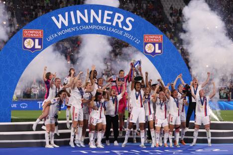 Olympique Lyonnais women's soccer team celebrates their UEFA Women's Champions League victory.