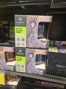 Boxes of Firefly solar hot air balloon spiral lights.