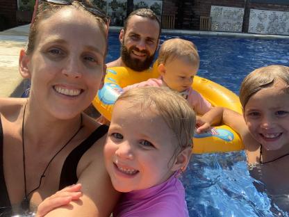 Family enjoying a pool in Bali.