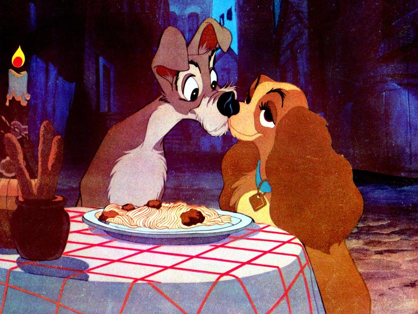 Illustration of Lady and the Tramp sharing spaghetti and meatballs.