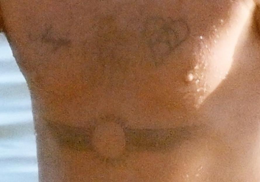 Close-up of Ant McPartlin's chest tattoos.