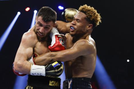 Devin Haney and Vasyl Lomachenko boxing.