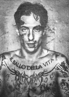 Black and white portrait of Damiano David with tattoos.