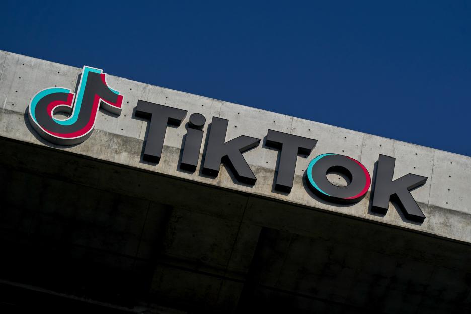 The TikTok logo with "TikTok" written in black letters and the musical note symbol in black with red and blue outlines.