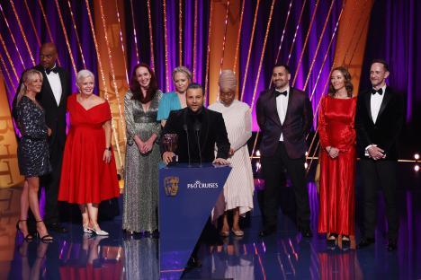 The EastEnders cast accepting a BAFTA Television Award.