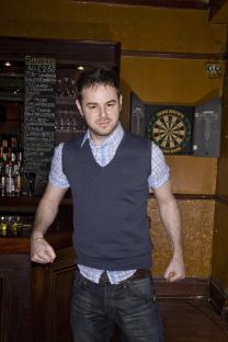 Portrait of Danny Dyer in a pub.