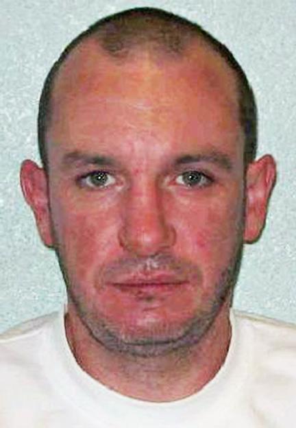 Mugshot of Nigel Farmer, a jailed torture killer.