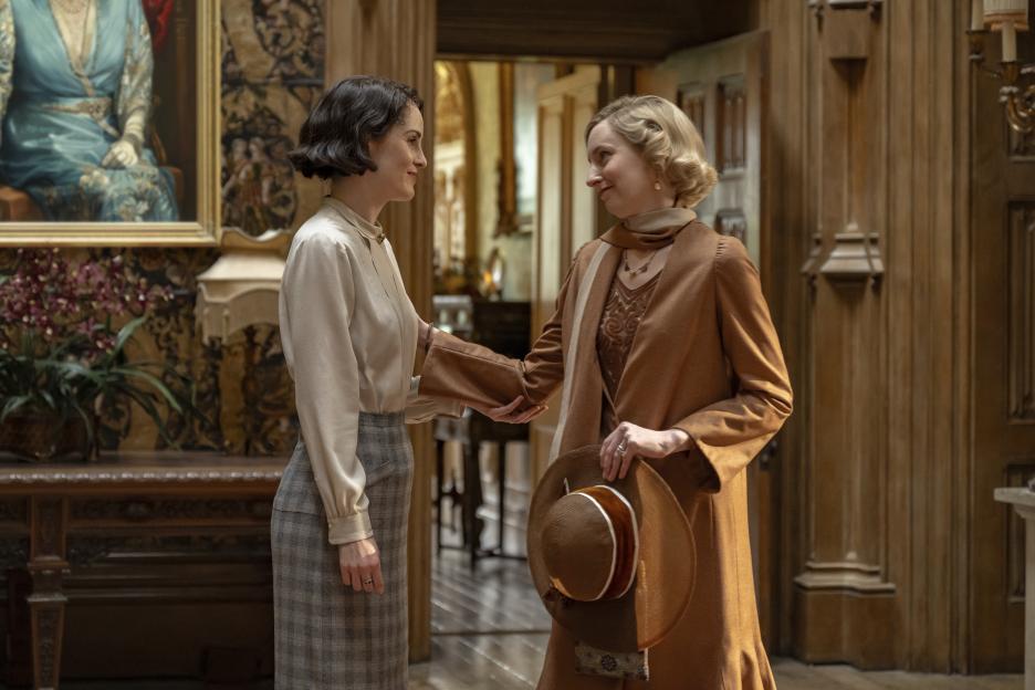 Michelle Dockery and Laura Carmichael in a scene from *Downton Abbey: The Grand Finale*.