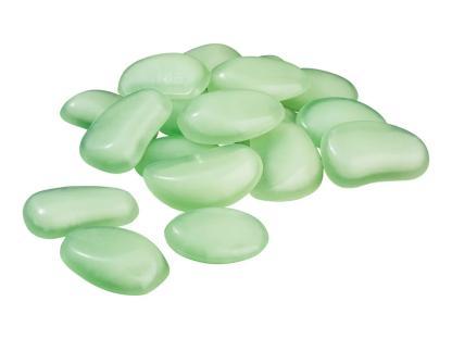 Pile of light green glow-in-the-dark pebbles.