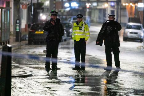 Police officers at a crime scene.