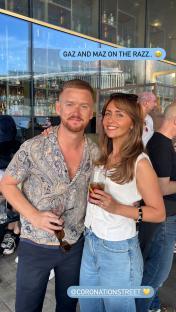 Samia Longchambon and a male colleague enjoying drinks.