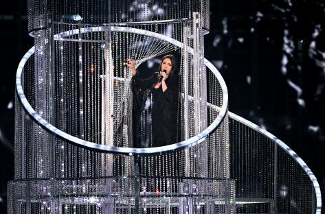 Yuval Raphael performing on a crystal-encrusted stage at Eurovision.