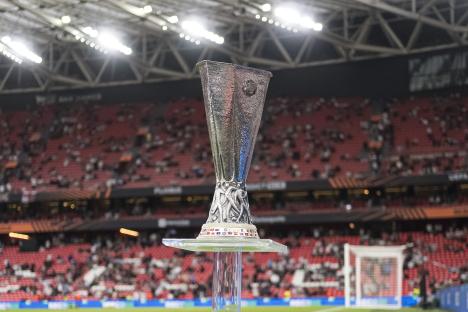 UEFA Europa League trophy in a stadium.