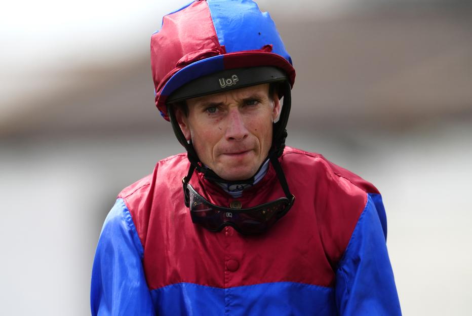 Ryan Moore in jockey silks after winning a race.