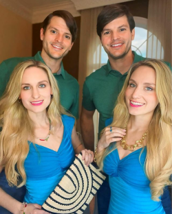 a man and two women are posing for a picture together