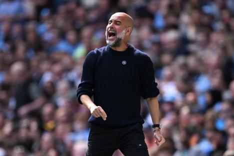 Pep Guardiola, Manchester City manager, reacting during a match.