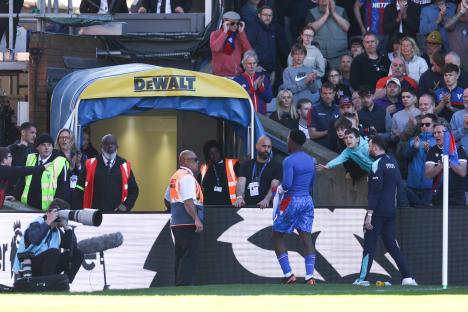 Eddie Nketiah of Crystal Palace leaves the field after receiving a second yellow card.