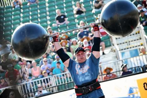 Rayno Nel of South Africa lifts a 154kg (340 lbs) circus barbell for two reps, during the Overhead Medley event on the first day of qualifying at the