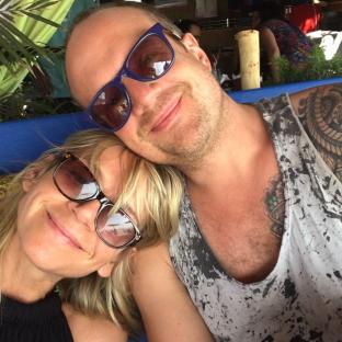 Zoe Ball and Billy Yates cuddling.