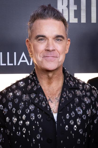 Robbie Williams Opens Up About Transformative Health Struggles: 