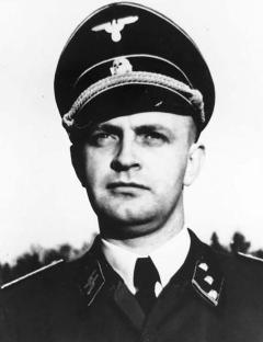 Black and white photo of Heinz Linge in SS uniform.