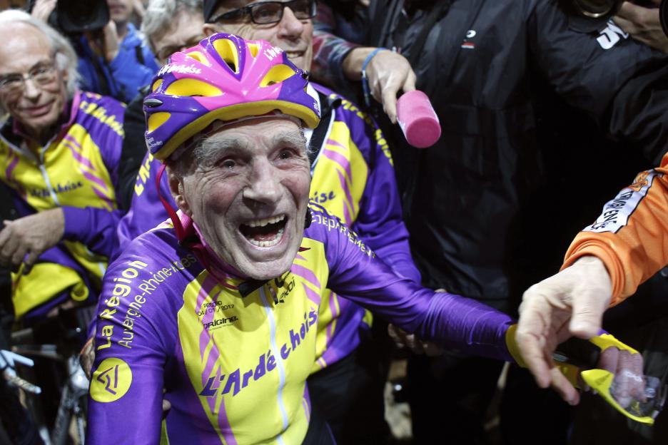 A 105-year-old cyclist celebrating a cycling record.