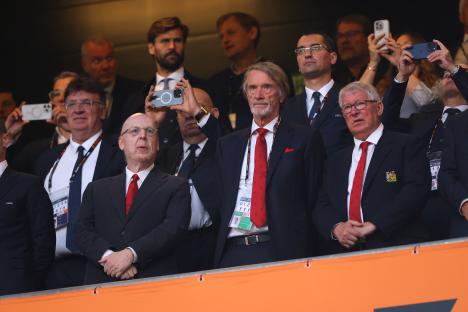 Avram Glazer and other Manchester United officials in the stands at a UEFA Europa League Final.