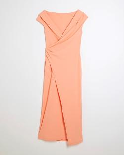 Peach midi dress with a wrap bodice and a side slit.