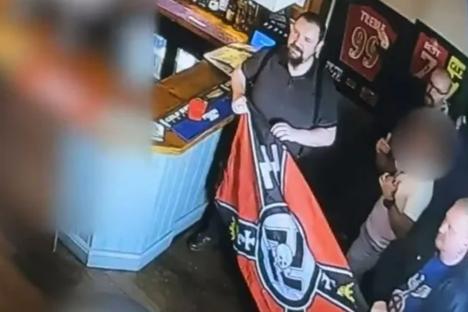 Police search for neo-Nazis who celebrated Hitler’s birthday in UK pub with swastika cake, flags & ‘Fuhrer’ footie shirt