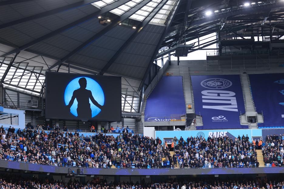 A silhouette of boxer Ricky Hatton displayed on a stadium big screen.