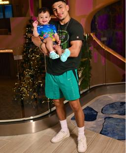 Man holding a toddler.