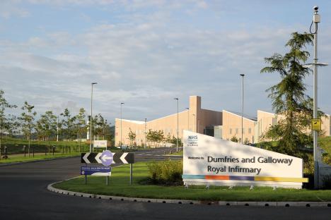 Dumfries and Galloway Royal Infirmary sign and building.