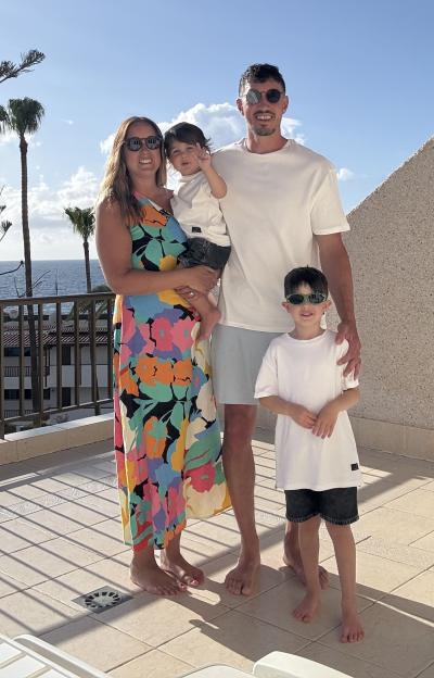 Family portrait on a patio.