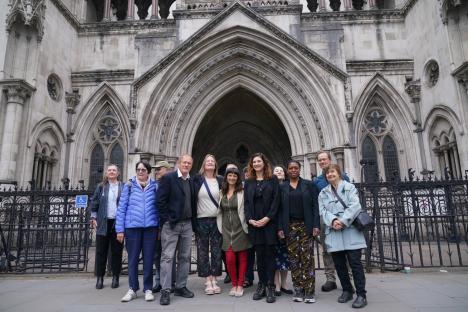Group of residents outside the High Court in London.