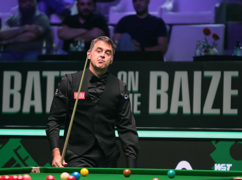 Ronnie O'Sullivan playing snooker.