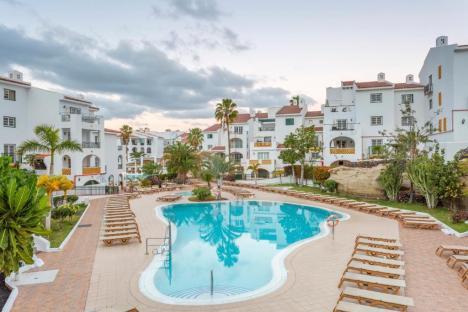 Sunset Harbour Club pool and surrounding buildings in Costa Adeje, Tenerife.