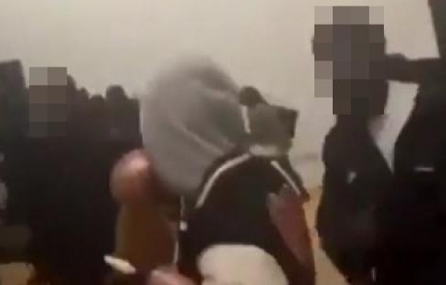 Shocking moment ‘knifemen’ charge into primary school party as 12 children arrested & two teens stabbed