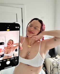 Anne-Marie showing off her baby bump.