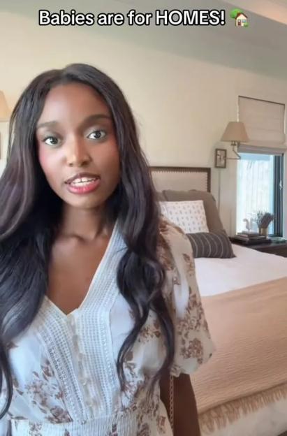 Woman in a bedroom says, "Babies are for HOMES!"
