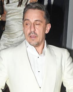 Gary Neville leaving David Beckham's 50th birthday party.