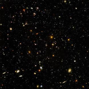 Hubble Ultra-Deep Field image showing distant galaxies.