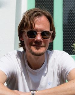 Portrait of Just Jack wearing sunglasses.