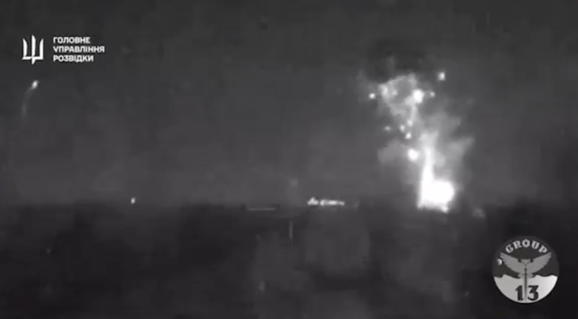 Night vision footage of an explosion.